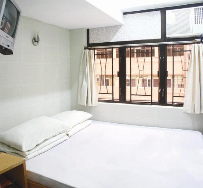 Oi Suen Guesthouse Hongkong Szoba fotó